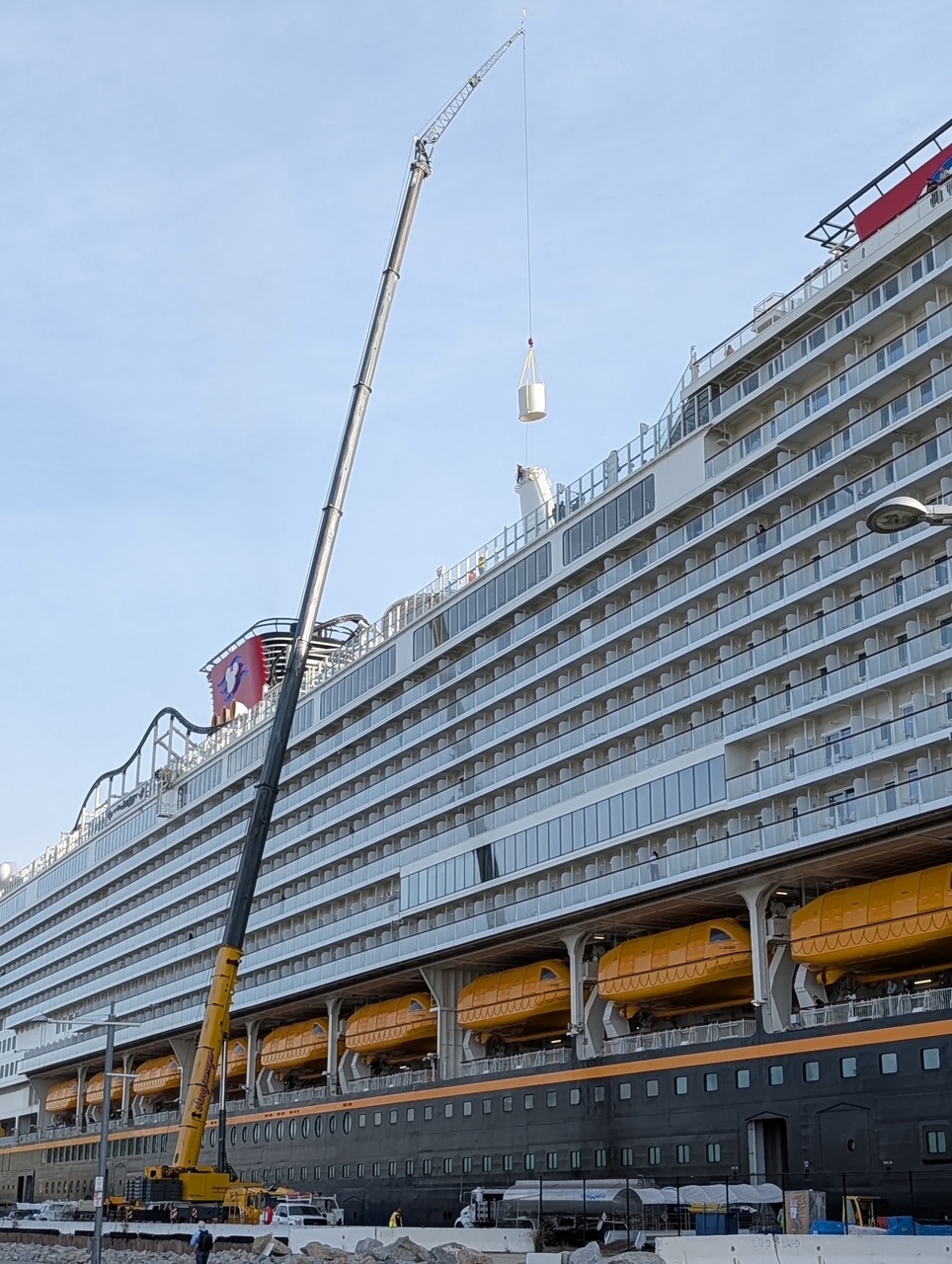 Anglemyer crane lifting part onto cruise ship